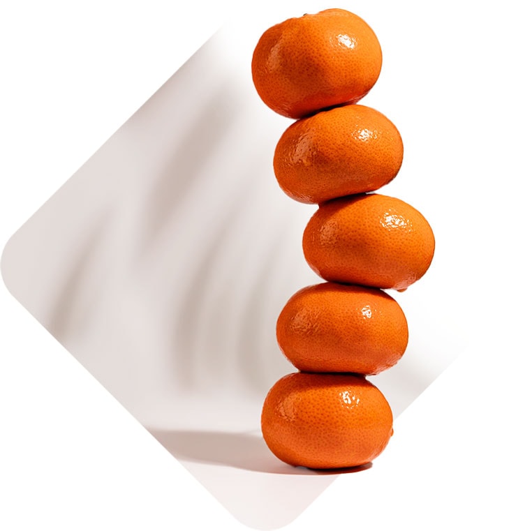 balancing stack of oranges